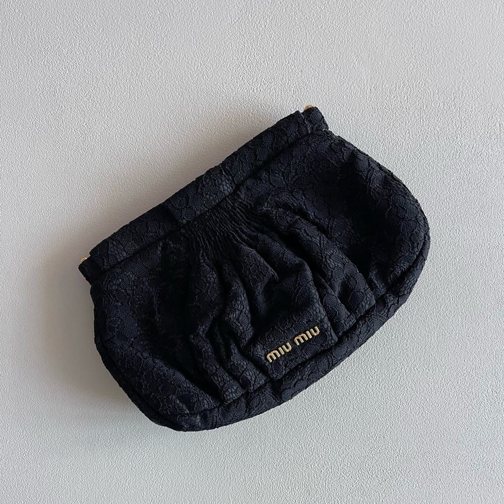 Miu Miu black lace clutch